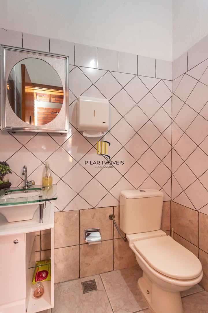 Casa 3 dormitórios no bairro Camaquã