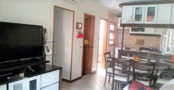 Casa em condomínio no Partenon de 3 dormitórios e vaga