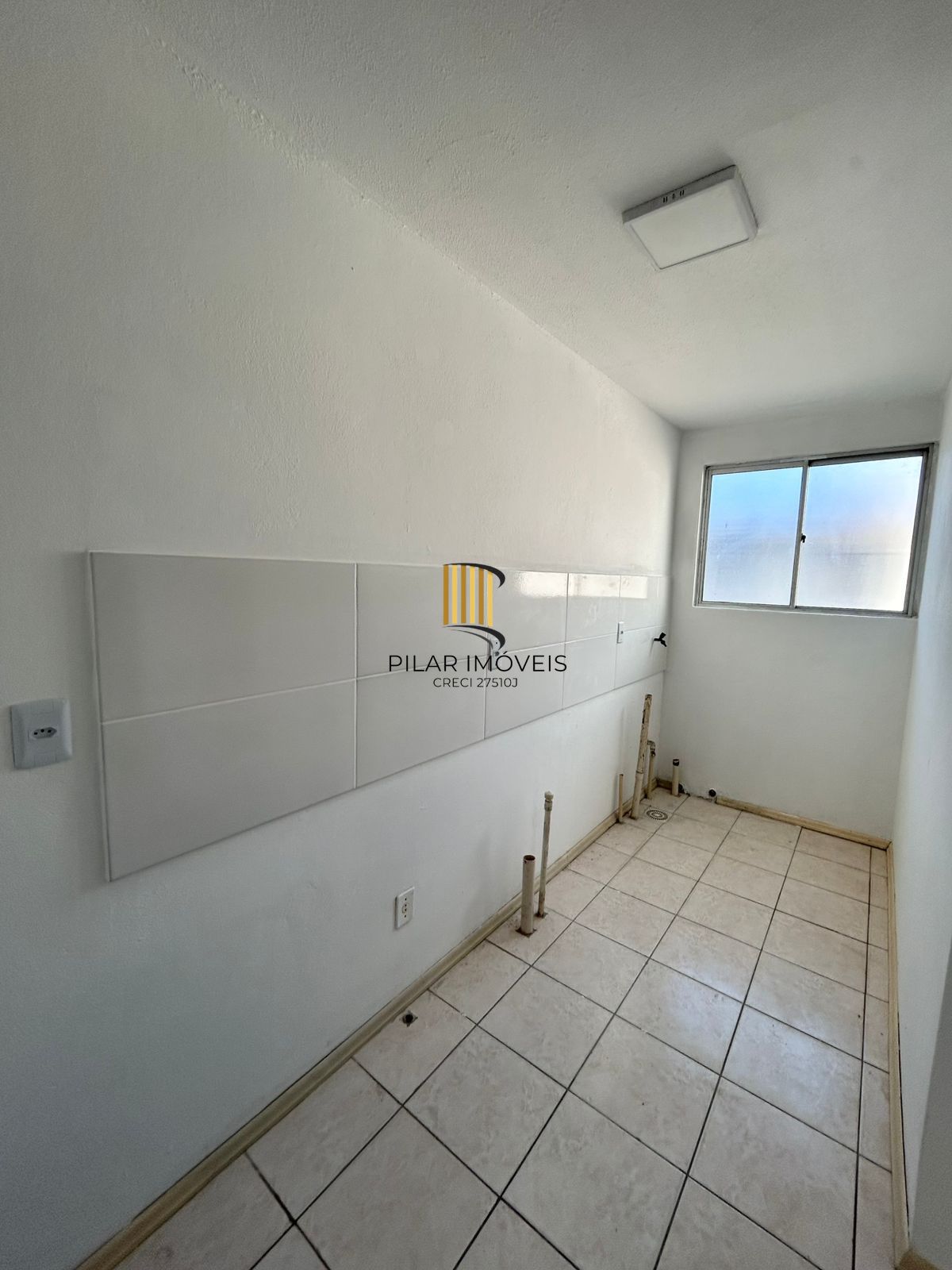 Apartamento de 2 dormitórios e vaga