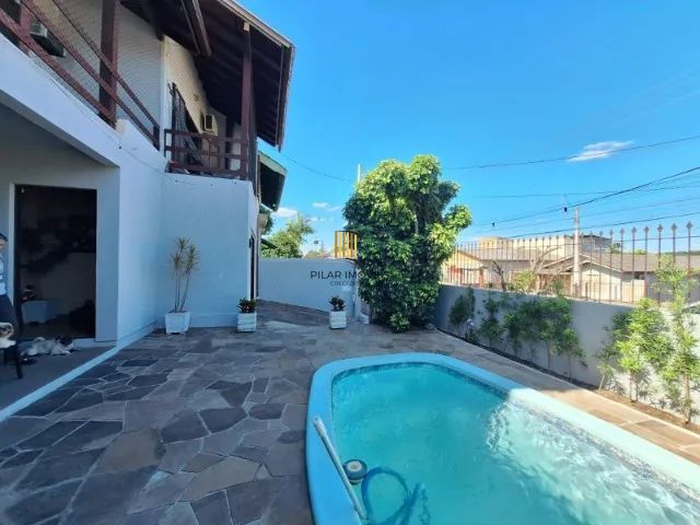 Casa 3 dormitórios no bairro Cristo Rei - Pilar Imóveis