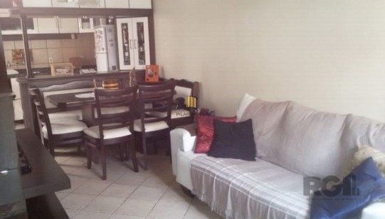 Casa em condomínio no Partenon de 3 dormitórios e vaga