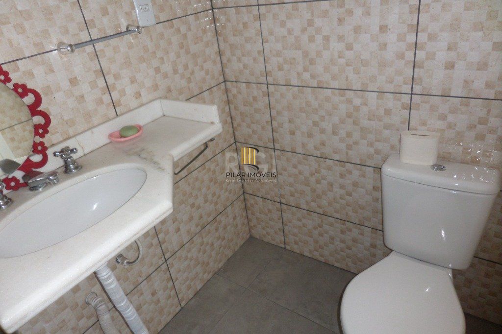 Casa no bairro Jardim Botânico de 3 dormitórios e 2 vagas