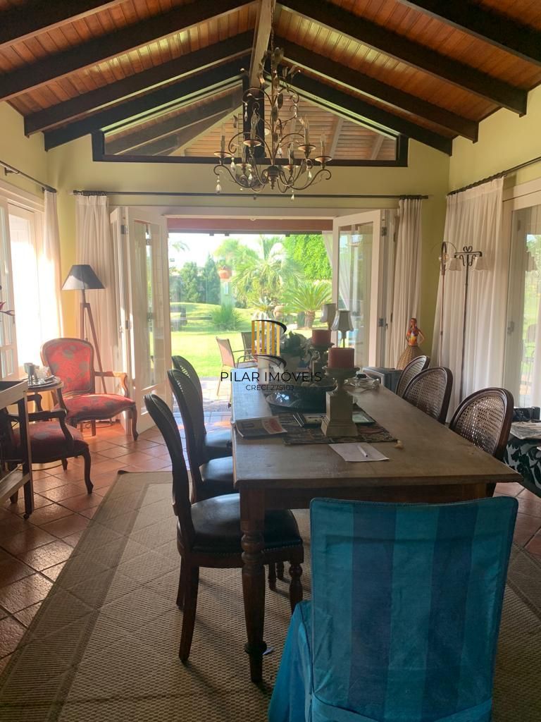 Casa na praia de Atlântida de 4 dormitórios