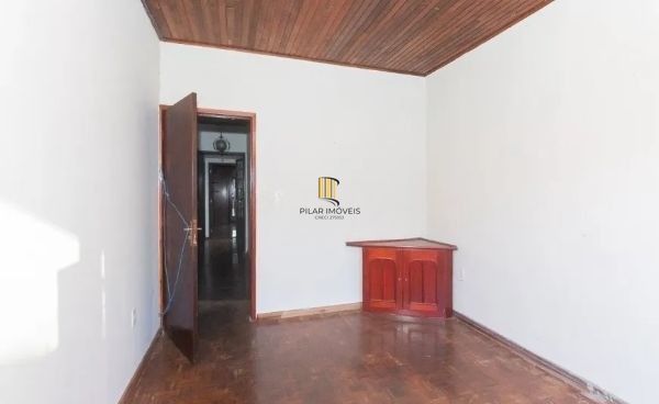 Casa no bairro Jardim Botânico de 4 dormitórios e 3 vagas