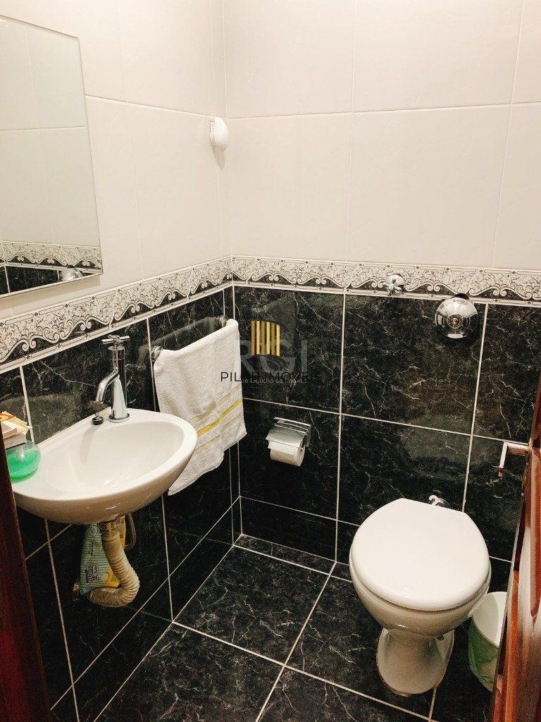 Apartamento no bairro Auxiliadora de 3 dormitórios e vaga