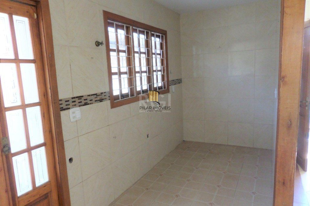 Casa na Hípica com 3 dormitórios e 2 vagas