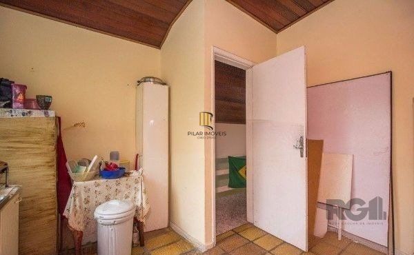 Casa sobrado no bairro Rio Branco de 4 dormitórios e vaga