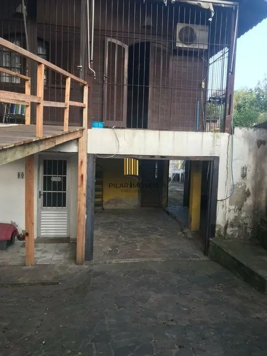 Casa 4 dormitórios no bairro Partenon