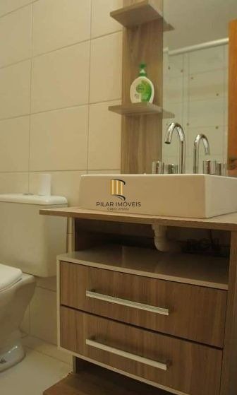 Apartamento no Urbano Menino Deus de 1 dormitório vaga e pátio