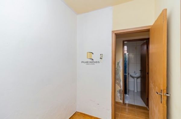 Casa / Terreno com 3 casas de alvenaria no bairro Morro Santana