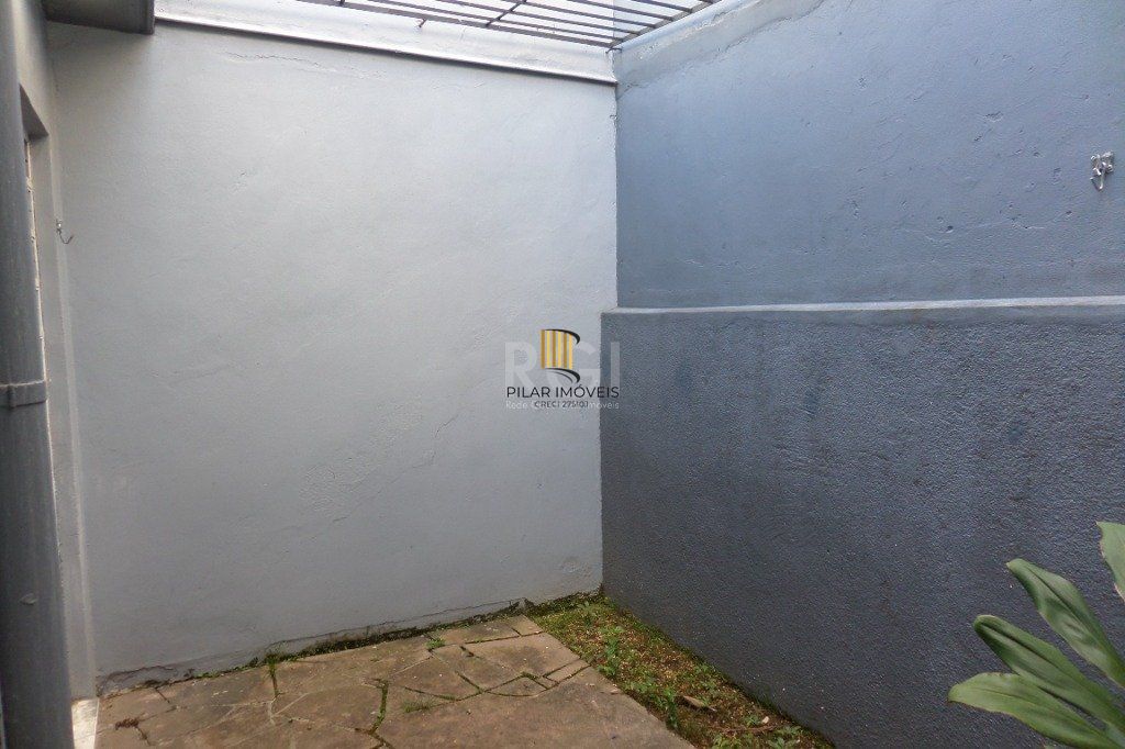 Casa no bairro Jardim Botânico de 3 dormitórios e 2 vagas