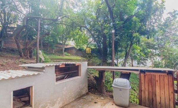 Casa em condomínio no bairro Santo Antômnio de 4 dormitórios e 2 vagas