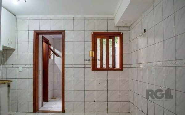 Casa em condominio no bairro Tristeza de 3 dormitórios e vaga