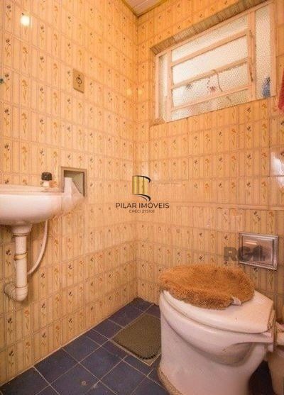 Casa sobrado no bairro Rio Branco de 4 dormitórios e vaga