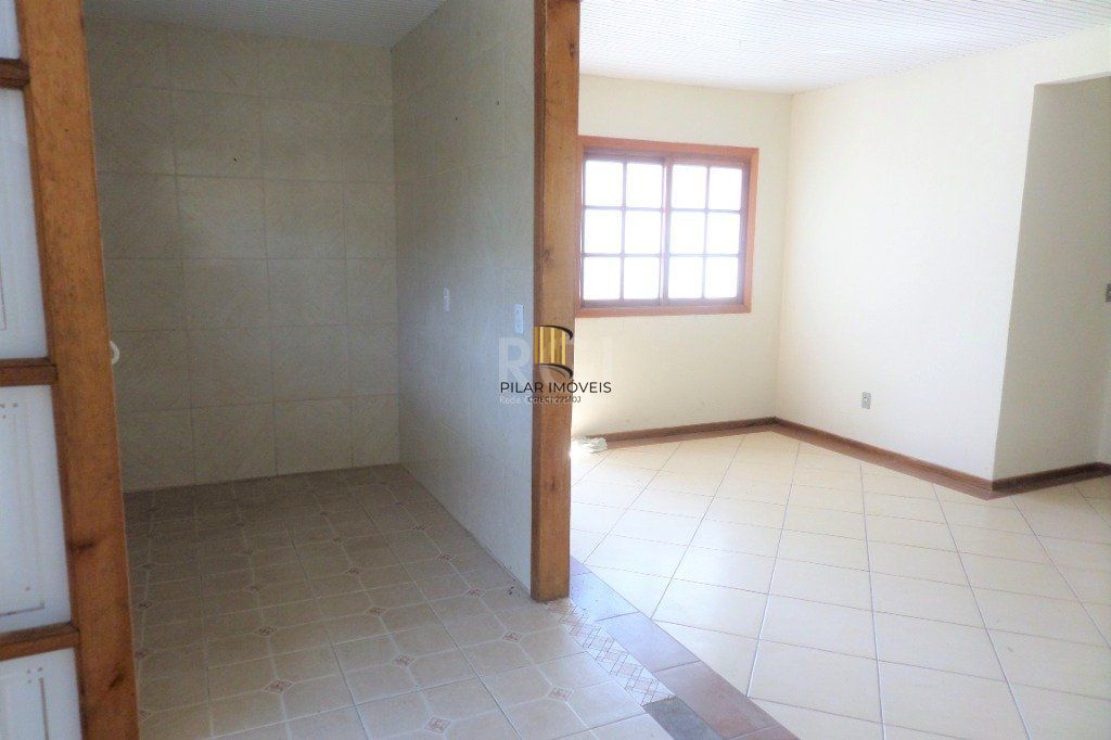Casa na Hípica com 3 dormitórios e 2 vagas