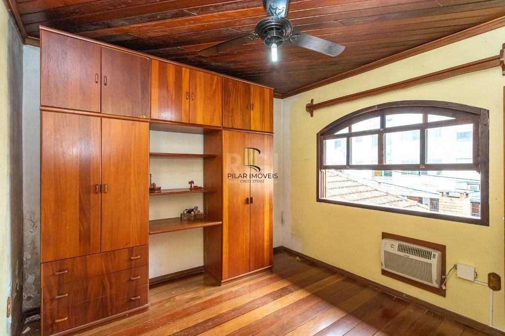 Casa sobrado no Jardim Botânico de 5 dormitórios e 2 vagas