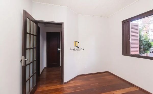 Casa no bairro Jardim Botânico de 4 dormitórios e 3 vagas