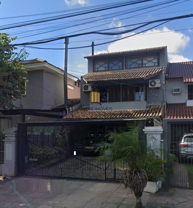 Casa sobrado no bairro Ecoville de 3 dormitórios e 4 vagas