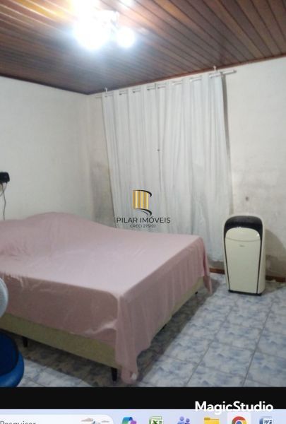 Casa sobrado no bairro Santo Antônio de 4 dormitórios e 2 vagas