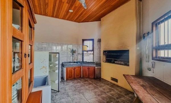 Casa em condomínio no bairro Santo Antômnio de 4 dormitórios e 2 vagas