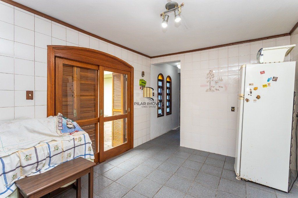 Casa sobrado no Jardim Botânico de 5 dormitórios e 2 vagas