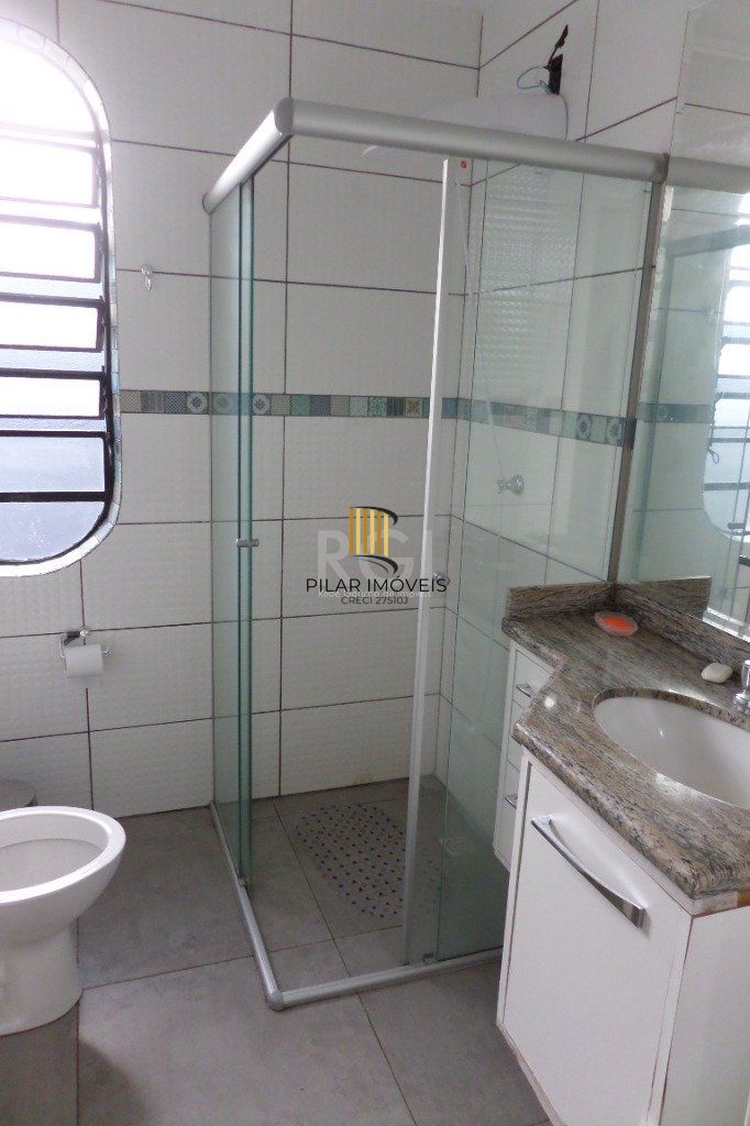 Casa no bairro Jardim Botânico de 3 dormitórios e 2 vagas