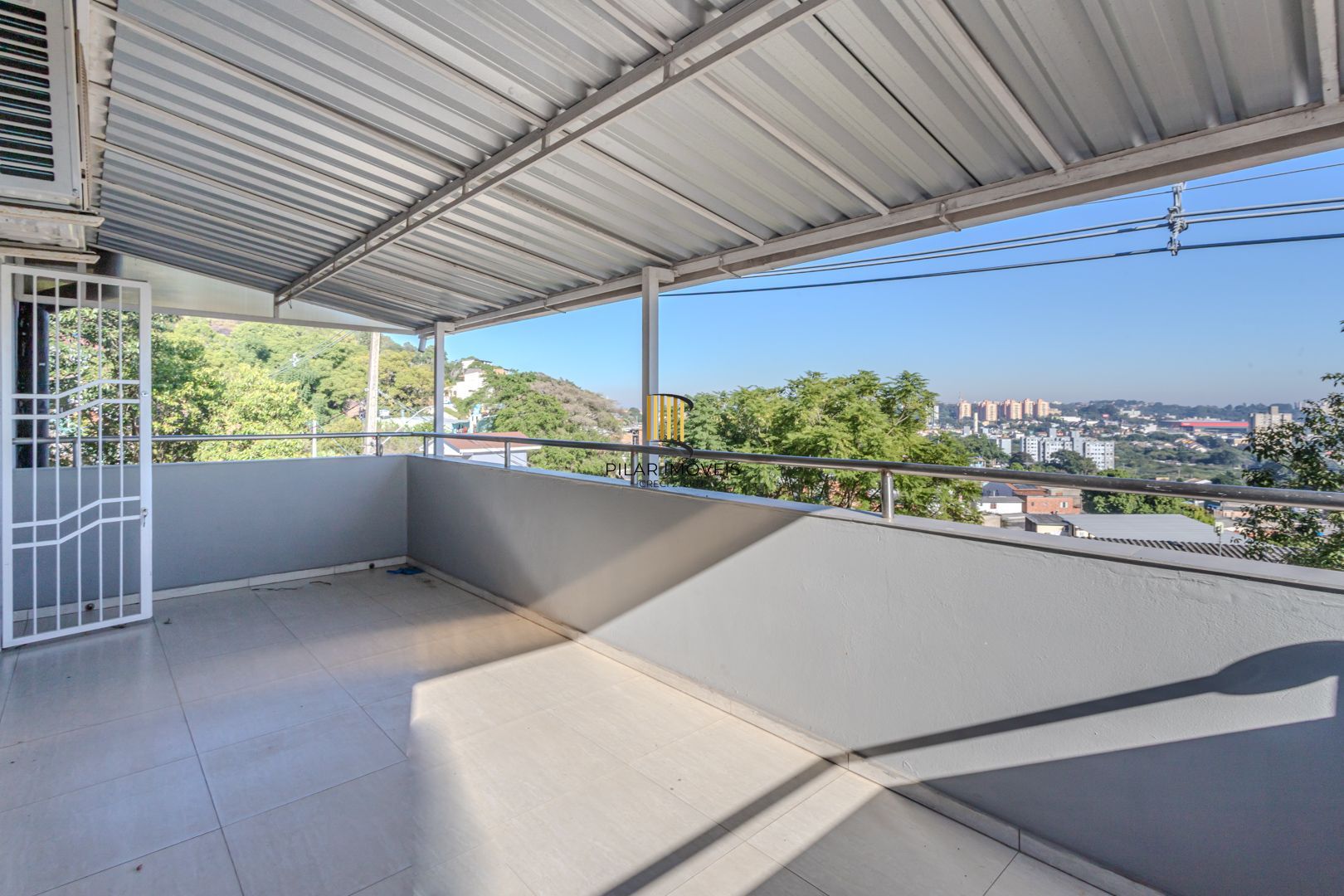 Casa sobrado no Morro Santana de 2 dormitórios e 2 vagas