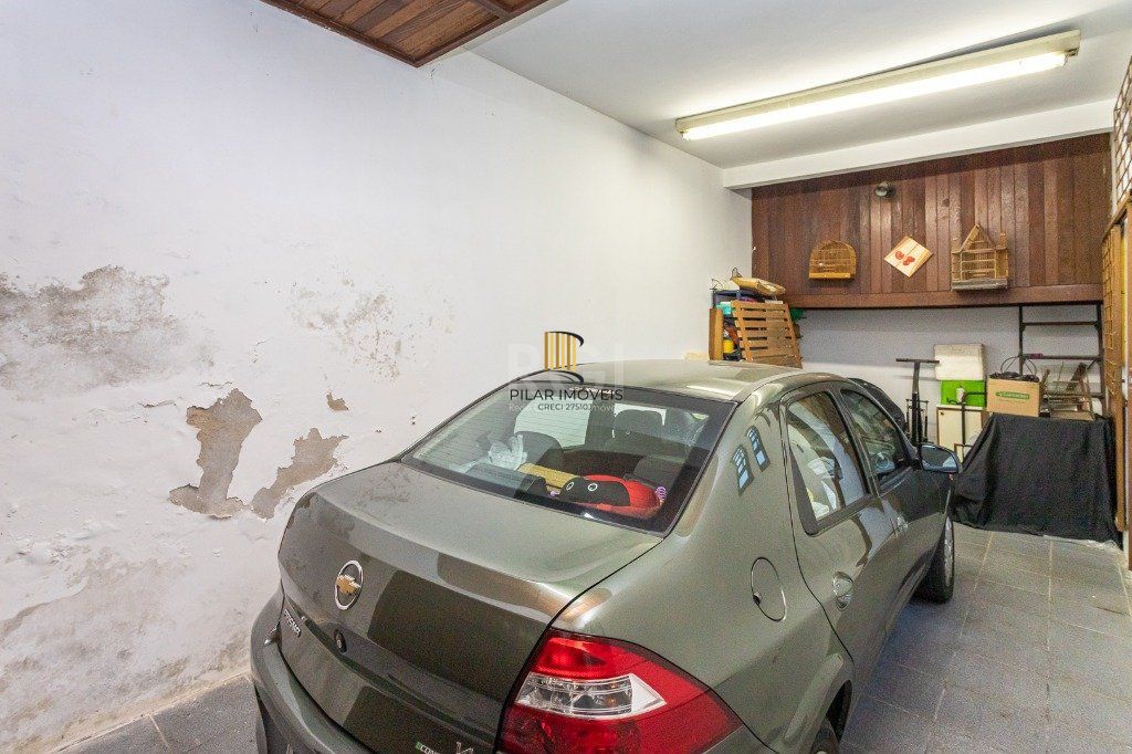 Casa sobrado no Jardim Botânico de 5 dormitórios e 2 vagas