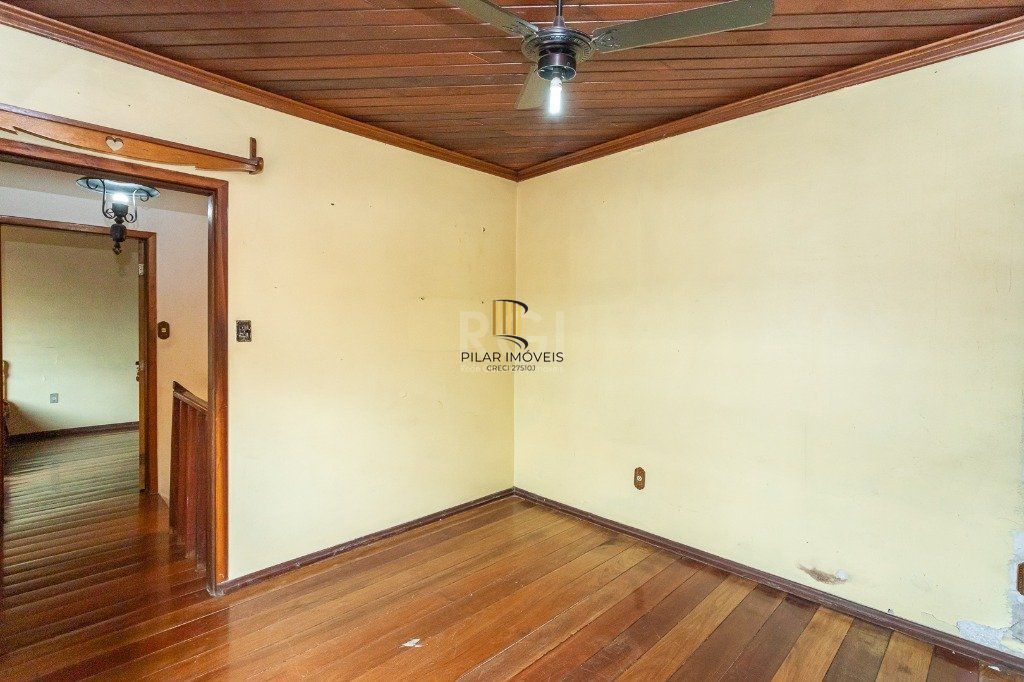 Casa sobrado no Jardim Botânico de 5 dormitórios e 2 vagas