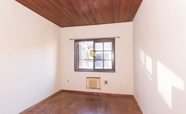 Casa no bairro Jardim Botânico de 4 dormitórios e 3 vagas