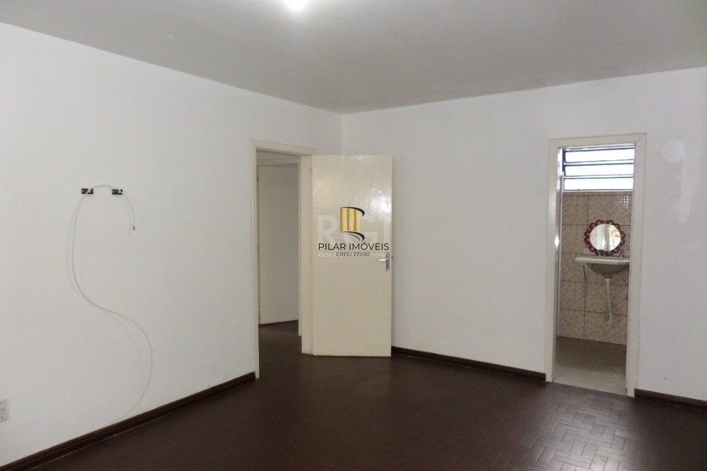 Casa no bairro Jardim Botânico de 3 dormitórios e 2 vagas