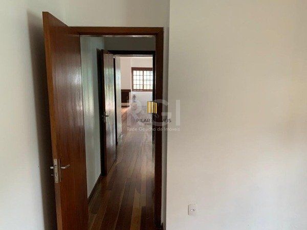 Casa no bairro Jardim Botânico de 3 dormitórios