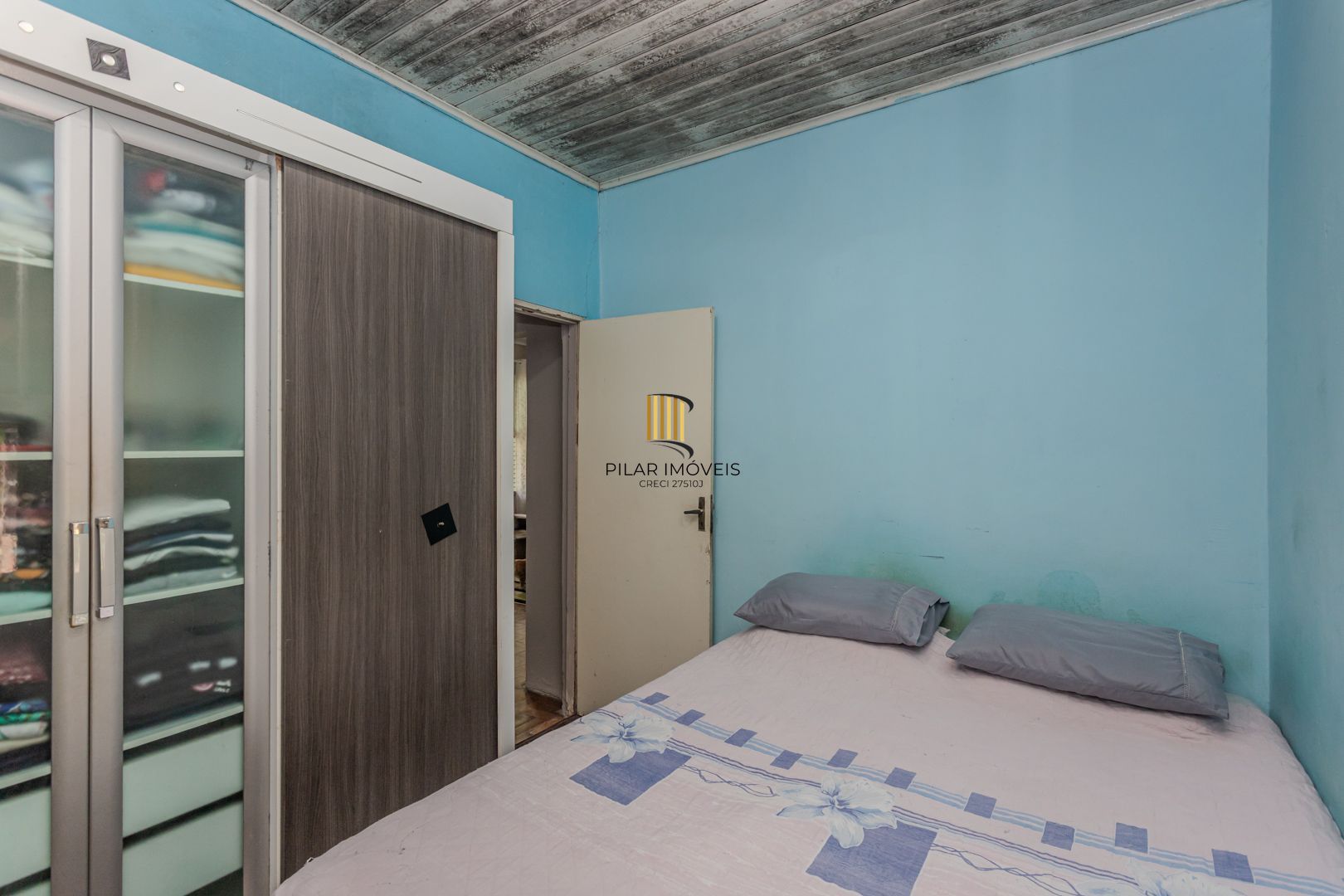 Casa no bairro Jardim Botânico de 3 dormitórios e garagem e terreno com 370m²