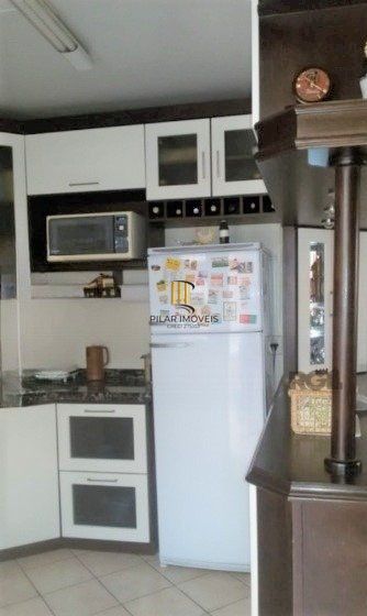 Casa em condomínio no Partenon de 3 dormitórios e vaga