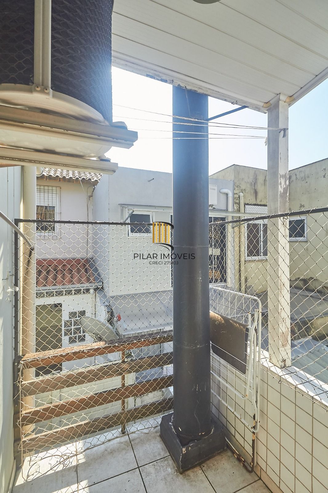 Casa sobrado em condomínio fechado no Alto Petrópolis de 2 dormitórios e vaga