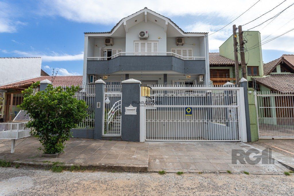 casa sobrado no Alto Petrópolis de 5 dormitórios e 3 vagas