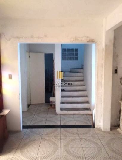 Casa sobrado no bairro Santo Antônio de 4 dormitórios e 2 vagas