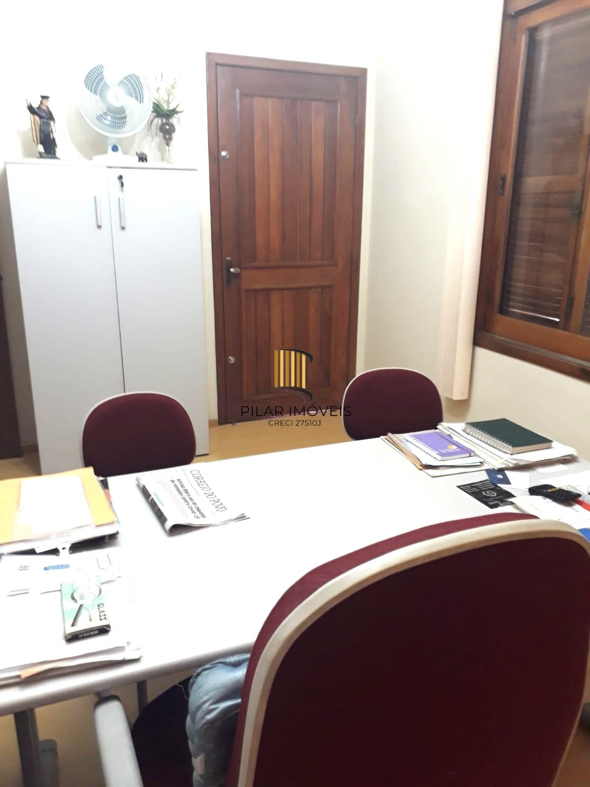 Casa sobrado no bairro Auxiliadora de 3 dormitórios e 3 vagas