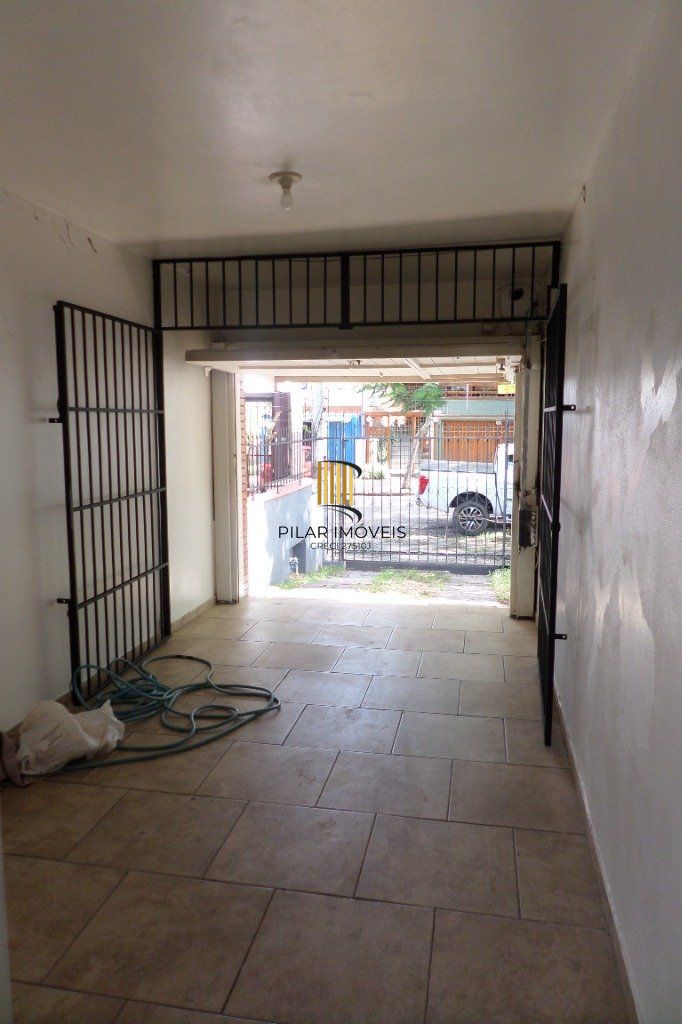Casa no bairro Jardim Botânico de 3 dormitórios e 2 vagas