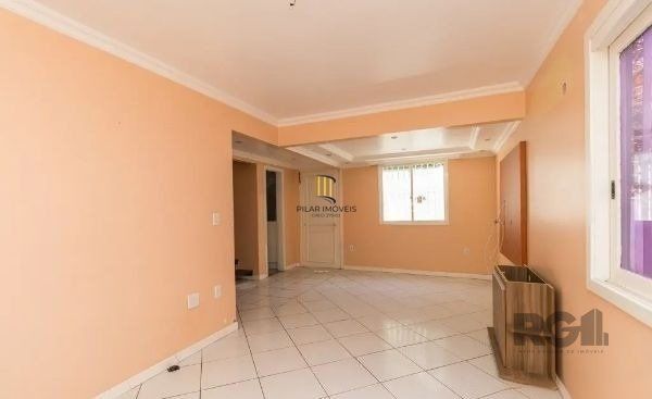 Sobrado no bairro Tristeza de 3 dormitórios e vaga DESOCUPADO