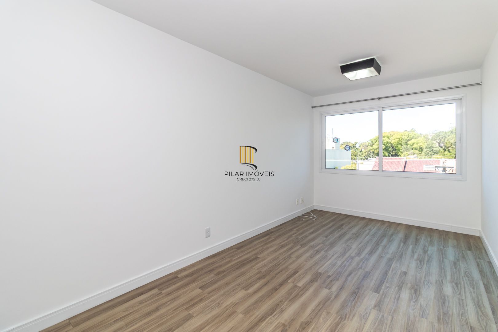 Apartamento no Jardim Botânico de 2 dormitórios e vaga DESOCUPADO