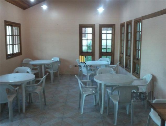 Casa em condomínio no Partenon de 3 dormitórios e vaga