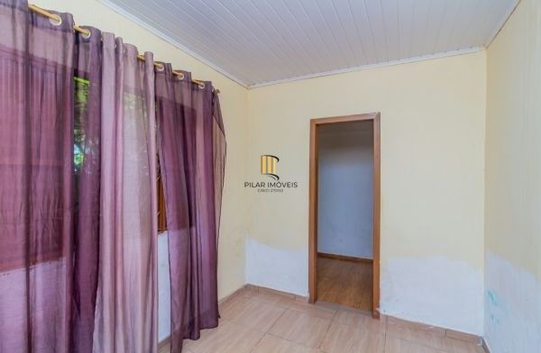 Casa / Terreno com 3 casas de alvenaria no bairro Morro Santana