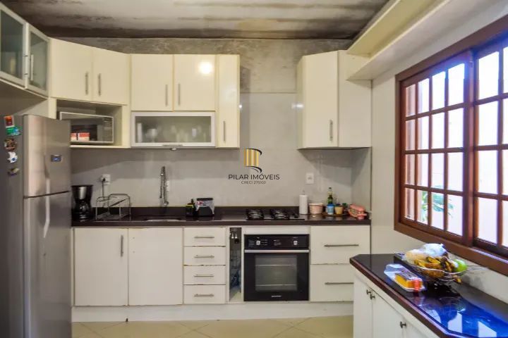 Casa 3 dormitórios no bairro Hípica