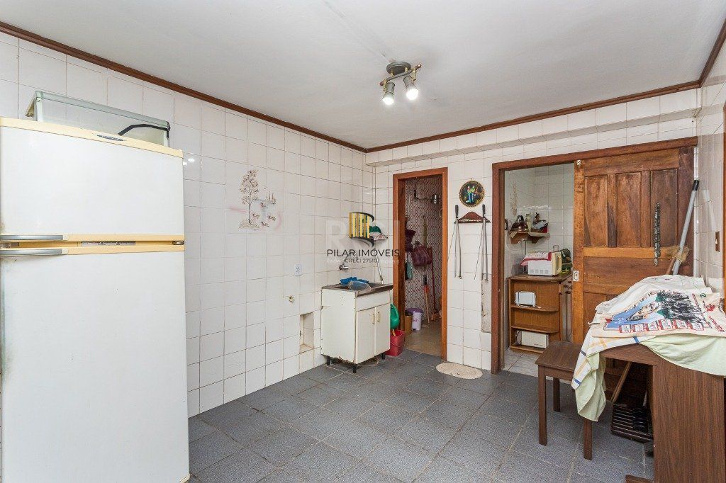 Casa sobrado no Jardim Botânico de 5 dormitórios e 2 vagas