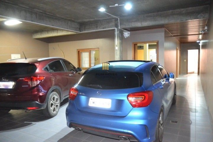 Casa Comercial e Residencial com 518m² (4 quartos / 5 banheiros / 3 vagas garagem) no Bairro Partenon localizada à meia quadra da Av. Bento Gonçalves.