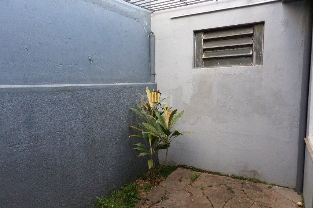 Casa no bairro Jardim Botânico de 3 dormitórios e 2 vagas