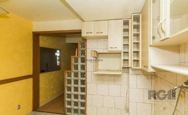 Casa condomínio no Humaitá de 3 dormitórios e vaga DESOCUPADA