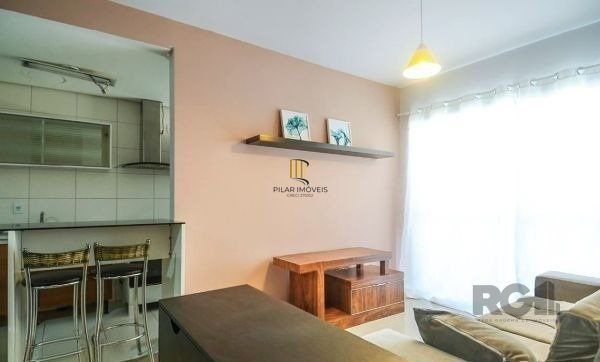 Apartamento no Urbano Menino Deus de 1 dormitório vaga e pátio