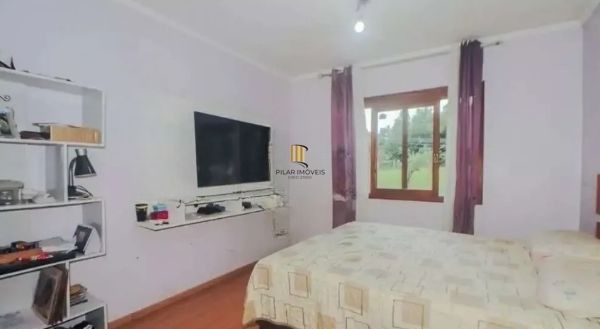 Casa sobrado no bairro Vila Ipiranga de 4 dormitórios e 2 vagas